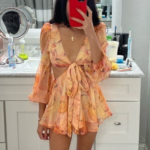 Orange tie dye romper